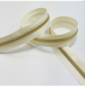 Fermeture éclair lurex écru et doré, élégante et lumineuse