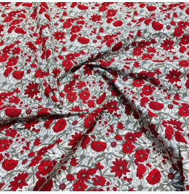 Coton imprimé Apolline rouge, motif floral dense et élégant.