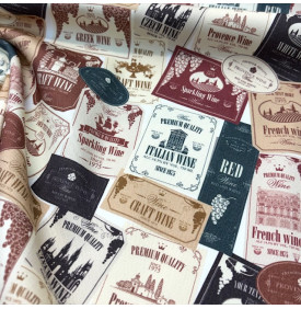 Tissu sergé de coton imprimé motif étiquettes de vin grand cru sur fond blanc