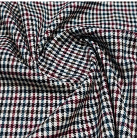Tissu tartan revisité au motif pied-de-poule, élégant et intemporel, aux nuances bordeaux et bleu marine