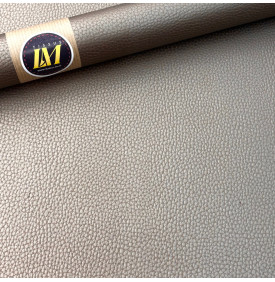 Simili cuir étain au grain fin et à l’aspect élégant. Un tissu résistant et technique
