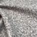 Tissu bouclette gris chiné, doux, épais et texturé, idéal pour couture
